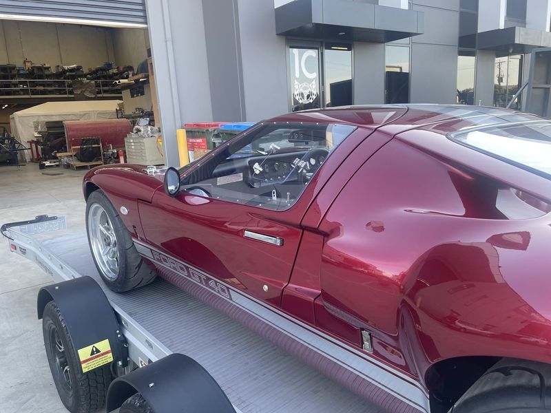 Red GT40 at the showroom entrance