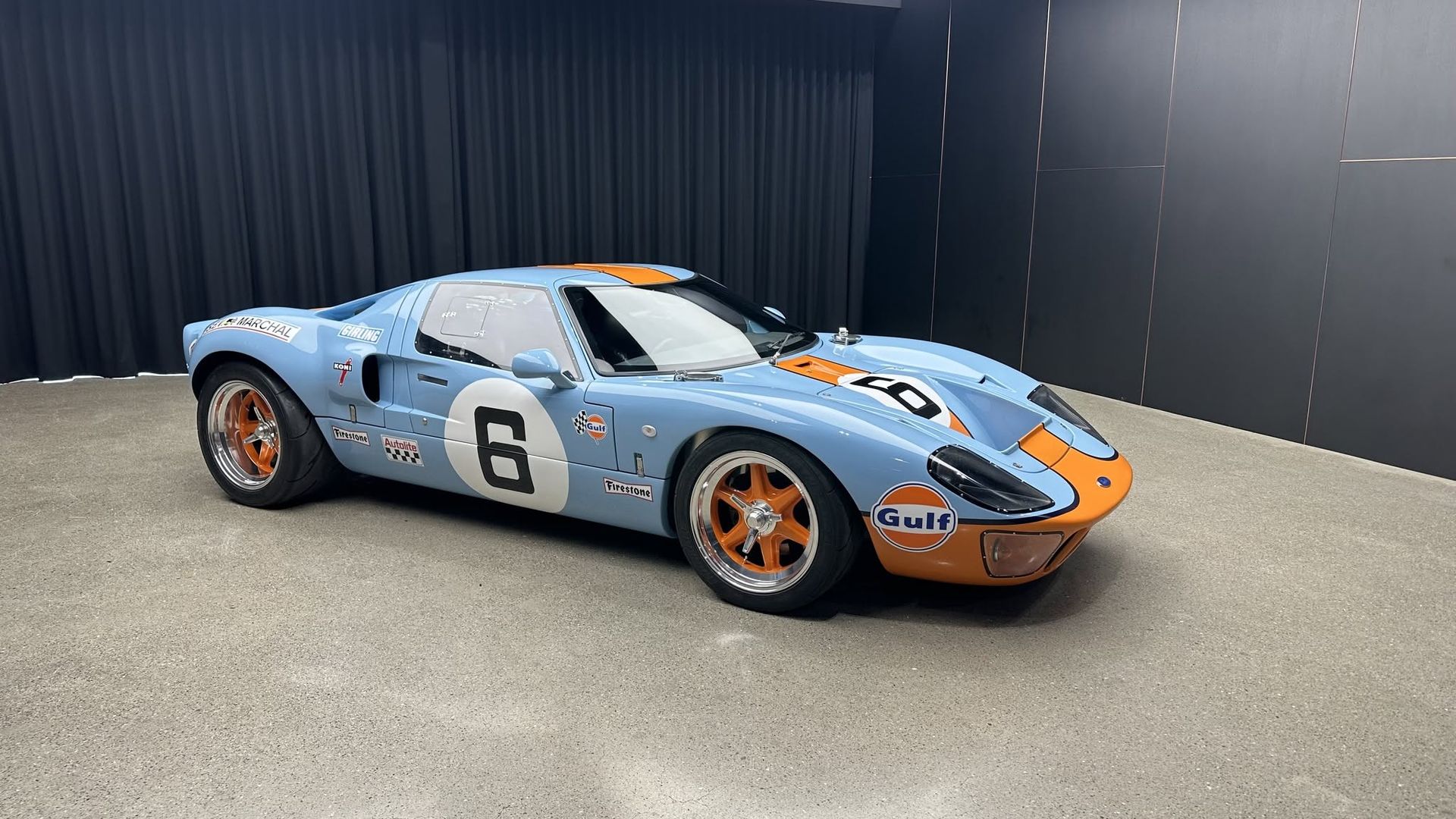 RF GT40 in heritage blue with a marigold stripe, side profile